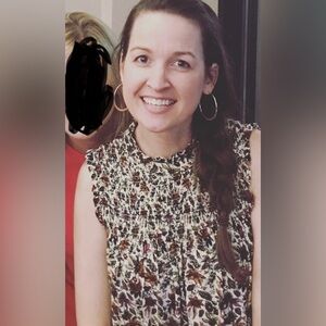 Beautiful sleeveless ruffle neck top